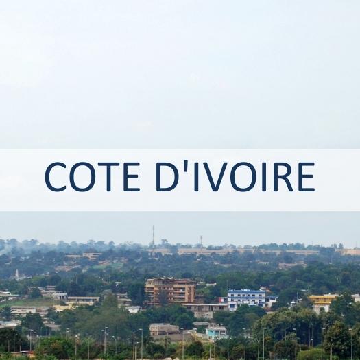 Cote d'Ivoire with photo of city skyline.